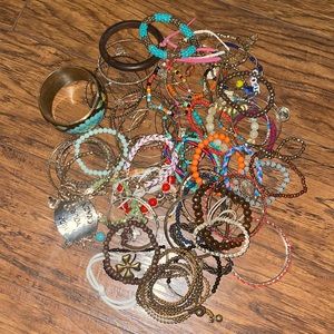 Lot of costume bracelets.